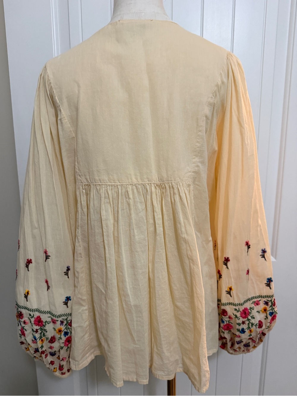 Cream Embroidered Peasant Blouse with Colorful Floral Detail - Picture 9 of 17